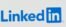 Smartphone showing LinkedIn logo with keyboard and large background logo, business theme.